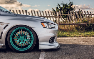 Silver car green rim pastel - a silver car free wallpaper