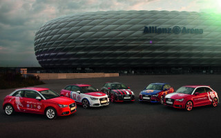 Four cars building sky green - official medium free wallpaper