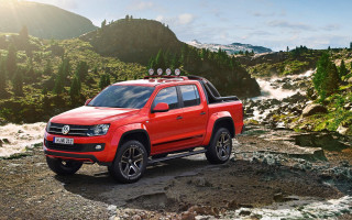 Red truck rocky hillside river - a red truck free wallpaper