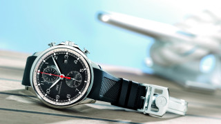 Watch table plane blue sky 2 - a plane in the background free wallpaper