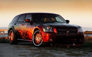 Black car fire rims bridge - a black car free wallpaper