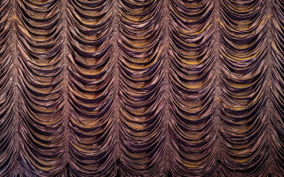 Large curtain wavy lines yellow - a yellow light in the middle free wallpaper