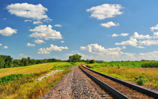 Train field clouds horizon nature - a grassy field free wallpaper