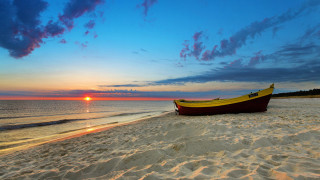 Boat sandy beach ocean sunset - sandy free wallpaper