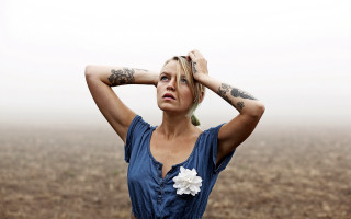 Tattooed woman field portrait blonde - tattoo free wallpaper