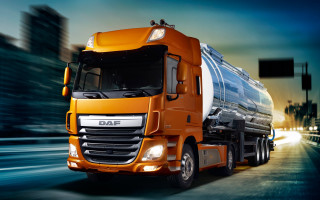 Large orange truck night city - a city street free wallpaper