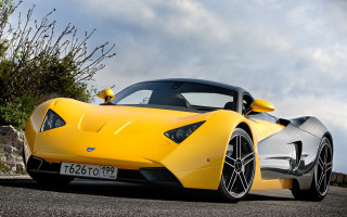 Yellow sports car road clouds 3 - the side of the road free wallpaper