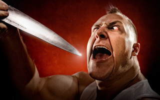 Man knife screaming red background - wide free wallpaper