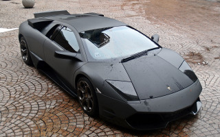 Grey sports car cobblestone street - a cobblestone street free wallpaper