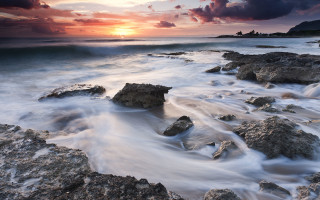 Rocky beach waves sunset clouds 2 - a rocky beach free wallpaper