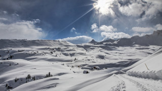Snow mountain trail sun clouds - a trail free wallpaper