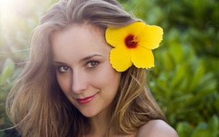 Woman flower hair smiling green - a yellow flower free wallpaper