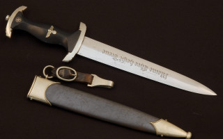 Gold handle engraved black blade - viennese actionism free wallpaper