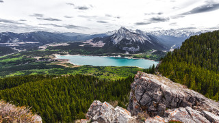 Mountain lake forest horizon sky - a view of a lake free wallpaper