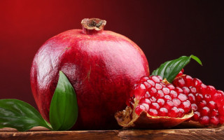 Pomegranate leaves fruit table top - a table top free wallpaper