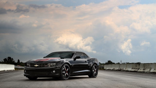 Black car cloudy sky red - a black car free wallpaper