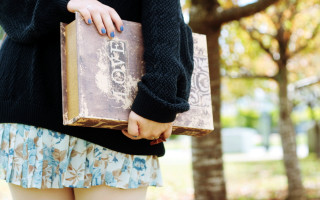 Woman holding book park trees - a park area free wallpaper