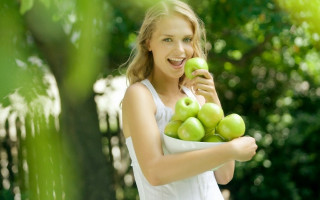 Woman green apples smiling outdoors - a bowl free wallpaper