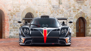 Black sports car stone building - a stone building free wallpaper