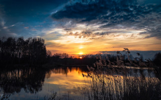 Sunset lake trees grass bridge - a sunset over a lake free wallpaper