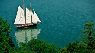 Sailboat lake trees clouds impressionist - tranquil free wallpaper