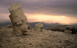 Rock face sculpture mountains cloudy - a face free wallpaper