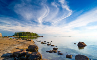 Rocky shore cloudy sky mountains 2 - akseli gallenkallela free wallpaper