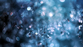Blurry bubbles blue background holography - a blurry photo of a bunch free wallpaper