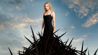 Woman black dress spikes sky 2 - symbolism free wallpaper