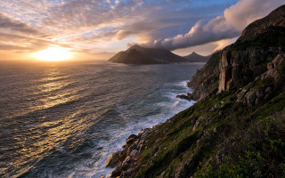 Rocky cliff water mountain cloudy - a view free wallpaper