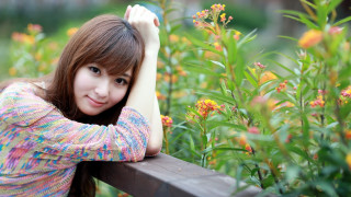 Woman leaning on rail flower - flower free wallpaper