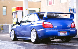 Blue car gas station puzzle - a gas station free wallpaper