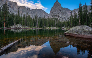 Mountain lake trees rocks clouds 2 - a mountain lake free wallpaper