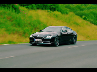 Black car road green hillside - lush free wallpaper
