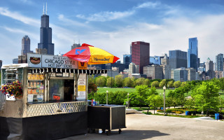Small stand colorful umbrella cityscape - tall building free wallpaper