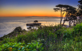Sunset dock trees water boat - the foreground and a body of water free wallpaper