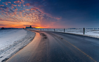 Sunset fence road distant building - a matte painting free wallpaper for desktop