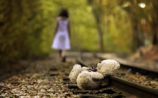 Teddy bear train tracks girl - a teddy bear free wallpaper