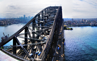 Bridge cityscape waterboat sunset australian - a city in the background and a boat free wallpaper