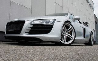 Silver sports car white wall 2 - a white wall behind free wallpaper