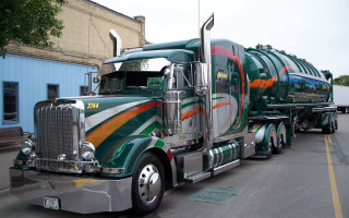 Green orange truck driving street - a street next free wallpaper