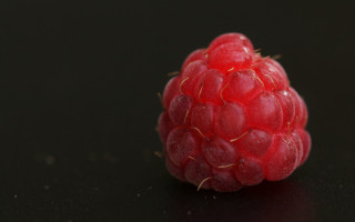 Raspberry black surface bites photorealism - center piece free wallpaper