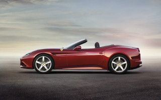 Red sports car sky clouds - a concrete surface free wallpaper