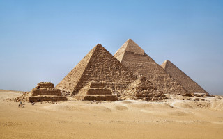 Pyramids desert sky person sand - the desert free wallpaper