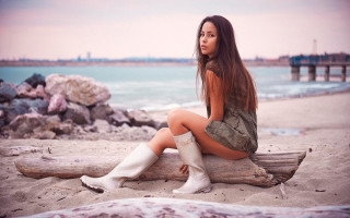 Woman beach log ocean pier - a log on free wallpaper