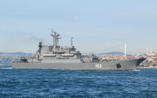Large gray ship city bridge - a jigsaw puzzle free wallpaper