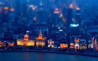 City skyline night river lights - tilt shift free wallpaper