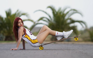 Redhaired woman skateboard outdoors photorealistic - a skateboard free wallpaper