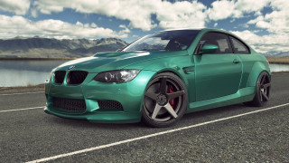 Green car lake mountains clouds - photorealism free wallpaper