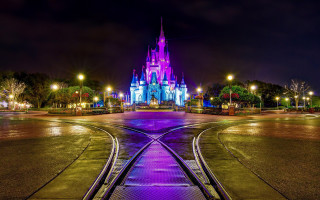 Castle train track night christmas - a clock tower in the background free wallpaper for desktop
